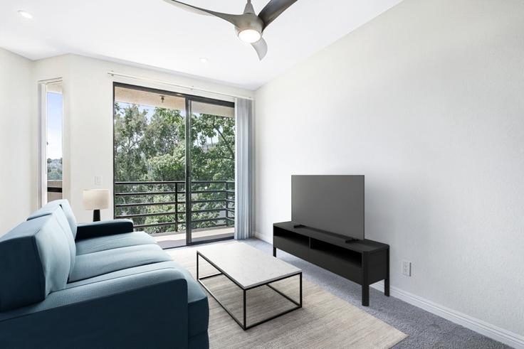 Los Angeles, Los Angeles에 위치한 Hollywood Vista - 562155 유닛의 세련된 인테리어가 돋보이는 거실 Los Angeles, Los Angeles에 위치한 Hollywood Vista - 562155 유닛의 세련된 인테리어가 돋보이는 거실