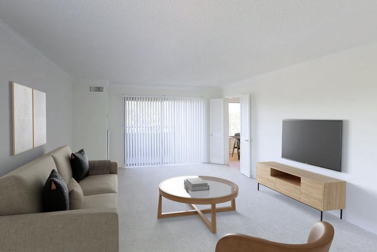 Elegante sala de estar con mobiliario moderno en un apartamento en Avalon at foxhall en Washington, Washington