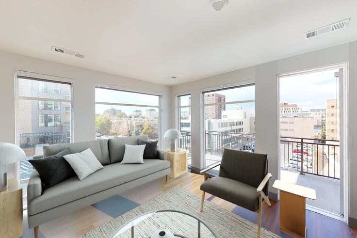 Salle de séjour élégante avec mobilier moderne dans un appartement à Cortland Cap Hill à Capitol Hill, Denver