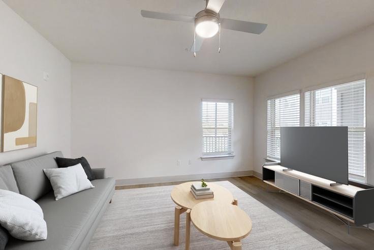 Elegant gestaltetes Wohnzimmer mit moderner Einrichtung in einer Wohnung im Cortland Satori in Pinellas Park, Pinellas Park