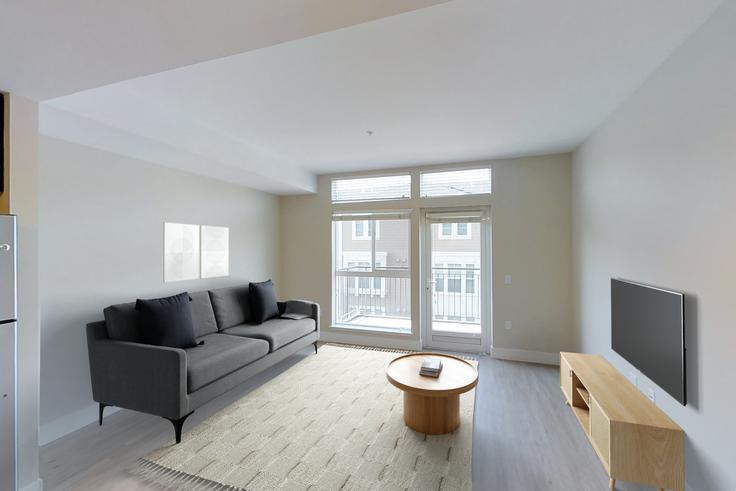 Sala de estar elegantemente projetada com móveis modernos em um apartamento no Avalon morrison park em San Jose, San Jose Sala de estar elegantemente projetada com móveis modernos em um apartamento no Avalon morrison park em San Jose, San Jose