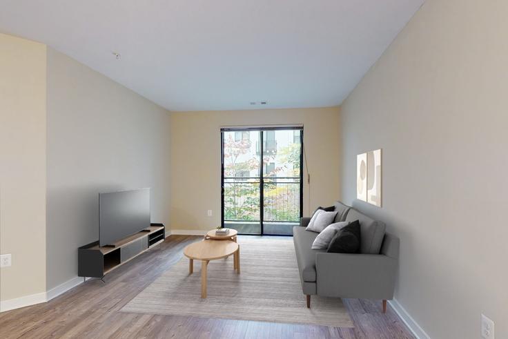 Avalon Mosaic adresindeki bir dairede modern mobilyalarla zarif bir şekilde tasarlanmış oturma odası Fairfax, Fairfax