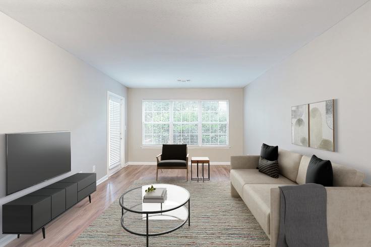 Avalon melville adresindeki bir dairede modern mobilyalarla zarif bir şekilde tasarlanmış oturma odası Melville, Huntington