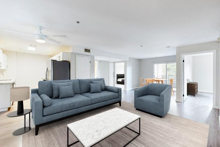 Elegant gestaltetes Wohnzimmer mit moderner Einrichtung in einer Wohnung im 18425 Malden-1 in Los Angeles, Los Angeles Elegant gestaltetes Wohnzimmer mit moderner Einrichtung in einer Wohnung im 18425 Malden-1 in Los Angeles, Los Angeles