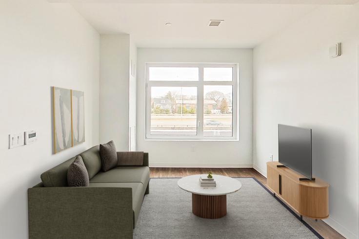 Salle de séjour élégante avec mobilier moderne dans un appartement à The Indie à Boston, Boston Salle de séjour élégante avec mobilier moderne dans un appartement à The Indie à Boston, Boston
